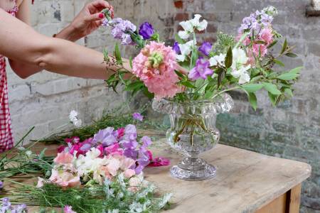 Glass flower vase with flowers